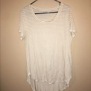 Maurice’s yellow and white striped shirt